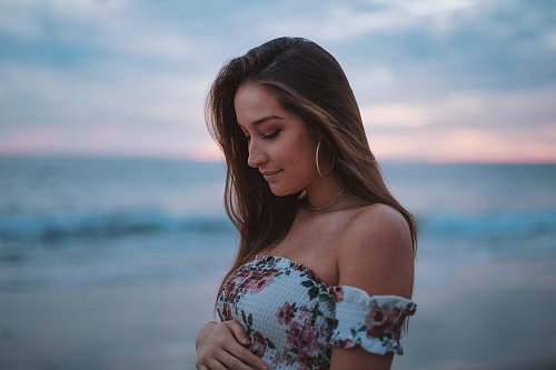 clothing woman in white and pink off-shoulder floral top apparel